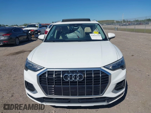 2021 Audi Q3 Premium with VIN WA1AUCF32M1097059, listed as a IAAI auction lot 41825132 with 66,144 mi miles and . Bid and sale history available at DreamBid. Image 12.