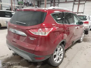 2014 Ford Escape Titanium with VIN 1FMCU9J9XEUA51732, listed as a IAAI auction lot 41542867 with 44,141 mi miles. Bid and sale history available at carsss.com. Image 4.