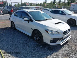 2016 Subaru WRX Premium z VIN JF1VA1E66G9820455, wystawiony jako IAAI lot #42517383 z przebiegiem 93 600 mil mil oraz . Historia ofert i sprzedaży dostępna na DreamBid. Obrazek 1.