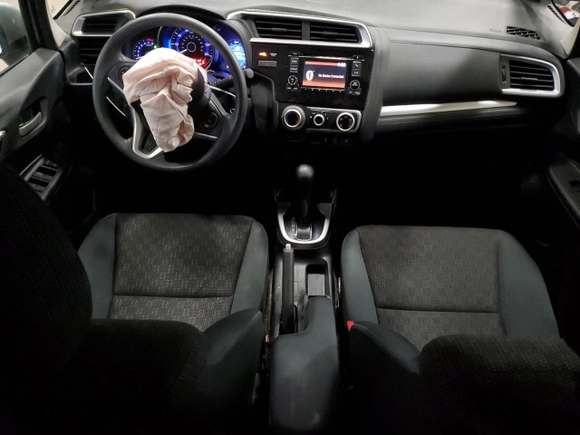 2015 Honda Fit LX с VIN 3HGGK5H56FM720996, выставлен на аукционе Copart как лот 57565945 с пробегом 90 222 миль миль и Списание • Salvage title. История ставок и продаж доступна на DreamBid. Изображение 8.