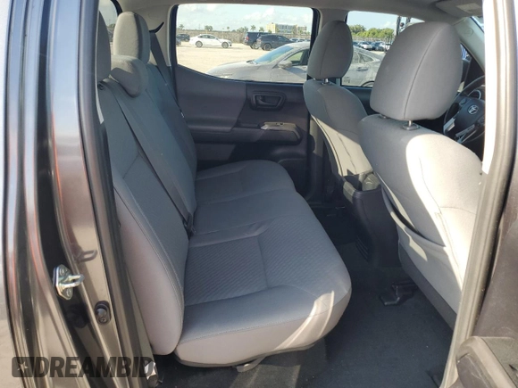 2020 Toyota Tacoma SR5 with VIN 3TMAZ5CN9LM125157, listed as a Copart auction lot 57178885 with 59,830 mi miles and Salvage title. Bid and sale history available at DreamBid. Image 10.