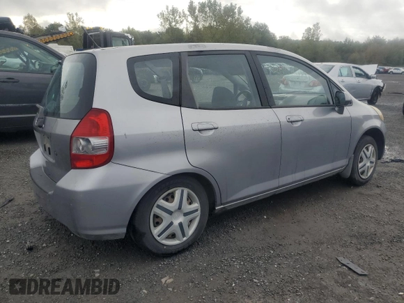 2007 Honda Fit with VIN JHMGD38417S025157, listed as a Copart auction lot 72768984 with 128,944 mi miles and Clean Title. Bid and sale history available at carsss.com. Image 3.