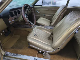 1967 Pontiac GTO z VIN 242077Z108825, wystawiony jako Copart lot #74747314 z przebiegiem 84 793 mil mil oraz Szkoda całkowita • Salvage title. Historia ofert i sprzedaży dostępna na DreamBid. Obrazek 7.