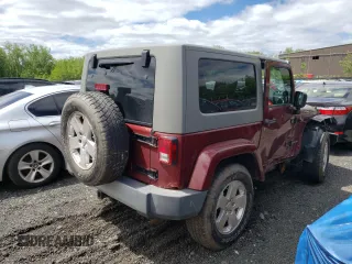 2008 Jeep Wrangler Sahara z VIN 1J4FA54198L505014, wystawiony jako Copart lot #55328045 z przebiegiem 128 049 mil mil oraz Szkoda całkowita • Salvage title. Historia ofert i sprzedaży dostępna na DreamBid. Obrazek 3.