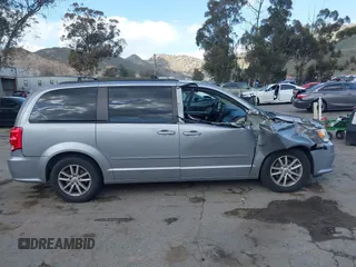 2016 Dodge Grand Caravan SXT with VIN 2C4RDGCG9GR180396, listed as a IAAI auction lot 41921312 with 130,256 mi miles and . Bid and sale history available at DreamBid. Image 14.