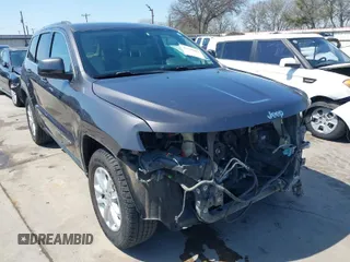 2015 Jeep Grand Cherokee Altitude with VIN 1C4RJEAG0FC952260, listed as a IAAI auction lot 41738692 with 124,197 mi miles. Bid and sale history available at carsss.com. Image 1.