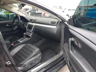 2013 Volkswagen CC Sport with VIN WVWBP7AN6DE504679, listed as a IAAI auction lot 42034362 with 148,527 mi miles. Bid and sale history available at carsss.com. Image 5.