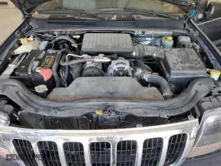 2001 Jeep Grand Cherokee Laredo with VIN 1J4GW48N41C557380, listed as a Copart auction lot 74080604 with 58,005 mi miles and Salvage Title. Bid and sale history available at carsss.com. Image 12.