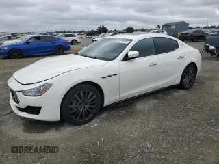 2018 Maserati Ghibli z VIN ZAM57XSA9J1271727, wystawiony jako Copart lot #52155305 z przebiegiem 62 081 mil mil oraz Szkoda całkowita • Salvage title. Historia ofert i sprzedaży dostępna na DreamBid. Obrazek 1.