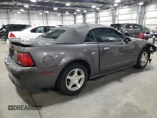 2003 Ford Mustang Deluxe z VIN 1FAFP44433F369534, wystawiony jako Copart lot #76606794 z przebiegiem 88 503 mil mil oraz Szkoda całkowita • Salvage title. Historia ofert i sprzedaży dostępna na DreamBid. Obrazek 3.