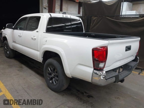 2023 Toyota Tacoma SR5 z VIN 3TYAZ5CN9PT030723, wystawiony jako IAAI lot #41607535 z przebiegiem 40 215 mil mil oraz . Historia ofert i sprzedaży dostępna na DreamBid. Obrazek 3.