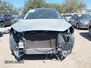 2019 Infiniti QX50 LUXE with VIN 3PCAJ5M19KF144488, listed as a IAAI auction lot 41811631 with 99,640 mi miles. Bid and sale history available at carsss.com. Image 13.