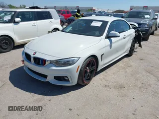 2015 BMW 4 Series 428i z VIN WBA3V7C52FP771779, wystawiony jako IAAI lot #41953647 z przebiegiem 66 003 mil mil oraz . Historia ofert i sprzedaży dostępna na DreamBid. Obrazek 2.