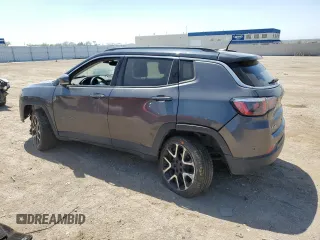 2018 Jeep Compass Limited with VIN 3C4NJDCB9JT261879, listed as a Copart auction lot 56523365 with 172,382 mi miles and Salvage title. Bid and sale history available at DreamBid. Image 2.