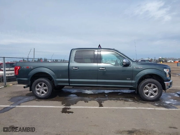2015 Ford F-150 XLT w/HD Payload Pkg with VIN 1FTFW1EG6FFB62533, listed as a IAAI auction lot 41828378 with 130,033 mi miles. Bid and sale history available at carsss.com. Image 14.