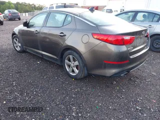 2015 Kia Optima LX z VIN 5XXGM4A79FG397995, wystawiony jako IAAI lot #42175785 z przebiegiem 159 239 mil mil oraz . Historia ofert i sprzedaży dostępna na DreamBid. Obrazek 3.