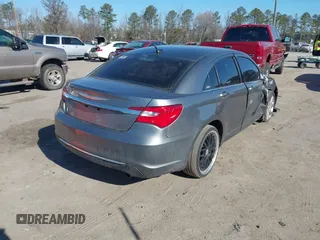 2012 Chrysler 200 Touring with VIN 1C3CCBBG9CN299980, listed as a IAAI auction lot 41689514 with 122,819 mi miles and . Bid and sale history available at carsss.com. Image 4.