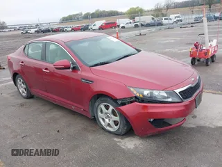 2013 Kia Optima LX with VIN 5XXGM4A70DG115613, listed as a IAAI auction lot 42095439 with 167,322 mi miles. Bid and sale history available at carsss.com. Image 1.