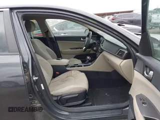 2016 Kia Optima LX with VIN KNAGT4L37G5070799, listed as a IAAI auction lot 41963239 with 116,308 mi miles. Bid and sale history available at carsss.com. Image 5.