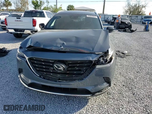 2021 Mazda CX-9 Grand Touring with VIN JM3TCADY1M0517525, listed as a Copart auction lot 43868965 with 123,602 mi miles and Salvage title. Bid and sale history available at DreamBid. Image 11.