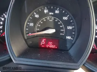 2014 Kia Rio LX with VIN KNADM4A39E6415521, listed as a IAAI auction lot 41411105 with 134,882 mi miles. Bid and sale history available at carsss.com. Image 16.