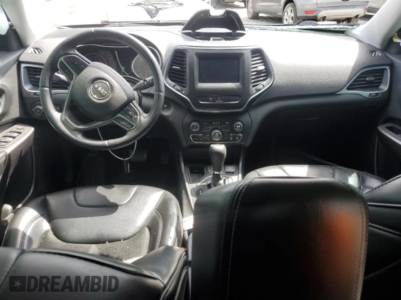 2019 Jeep Cherokee Latitude Plus with VIN 1C4PJLLN0KD119876, listed as a Copart auction lot 60462765 with 61,909 mi miles and Salvage title. Bid and sale history available at DreamBid. Image 8.