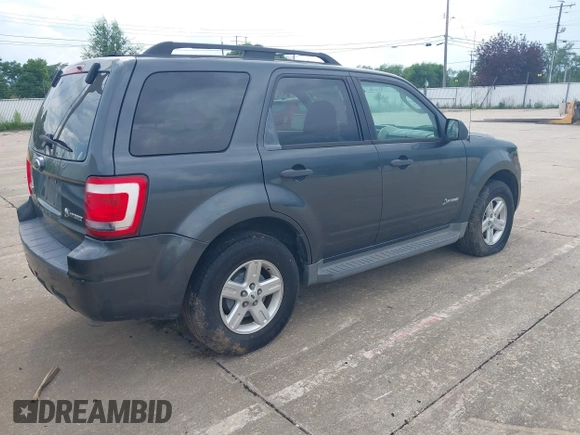 2009 Ford Escape Hybrid with VIN 1FMCU49319KC97511, listed as a IAAI auction lot 42735047 with 255,260 mi miles and . Bid and sale history available at DreamBid. Image 4.