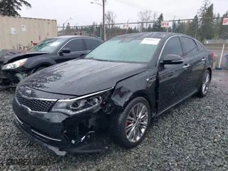 2018 Kia Optima SX with VIN 5XXGV4L26JG227603, listed as a IAAI auction lot 41648127 with 34,391 mi miles. Bid and sale history available at carsss.com. Image 6.
