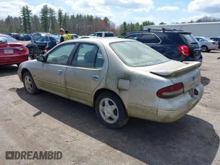 1997 Nissan Altima XE with VIN 1N4BU31D8VT205299, listed as a IAAI auction lot 42081935 with 235,426 mi miles. Bid and sale history available at carsss.com. Image 3.