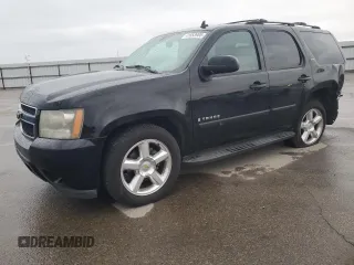 2007 Chevrolet Tahoe LTZ z VIN 1GNFC13067R267773, wystawiony jako Copart lot #41653905 z przebiegiem 197 538 mil mil oraz Szkoda całkowita • Salvage title. Historia ofert i sprzedaży dostępna na DreamBid. Obrazek 1.