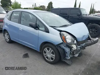 2009 Honda Fit z VIN JHMGE88269S031998, wystawiony jako IAAI lot #41888814 z przebiegiem 98 399 mil mil oraz . Historia ofert i sprzedaży dostępna na DreamBid. Obrazek 1.