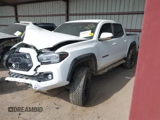 2021 Toyota Tacoma SR z VIN 3TMCZ5AN4MM373247, wystawiony jako IAAI lot #41982617 z przebiegiem 45 692 mil mil oraz . Historia ofert i sprzedaży dostępna na DreamBid. Obrazek 19.