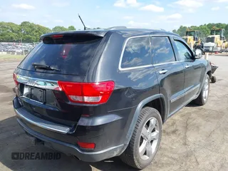 2013 Jeep Grand Cherokee Overland with VIN 1C4RJECT3DC526005, listed as a IAAI auction lot 42064151 with 112,777 mi miles and . Bid and sale history available at DreamBid. Image 4.