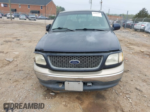 1999 Ford F-150 XL with VIN 1FTRX17L8XNA16906, listed as a IAAI auction lot 41945377 with 249,475 mi miles. Bid and sale history available at carsss.com. Image 13.