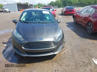 2019 Ford Fiesta SE z VIN 3FADP4EJ9KM125252, wystawiony jako IAAI lot #42221622 z przebiegiem 57 366 mil mil oraz . Historia ofert i sprzedaży dostępna na DreamBid. Obrazek 13.