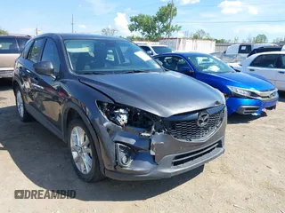 2014 Mazda CX-5 Grand Touring with VIN JM3KE2DY8E0383206, listed as a IAAI auction lot 40205756 with 120,231 mi miles. Bid and sale history available at carsss.com. Image 6.