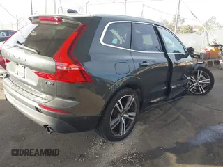 2019 Volvo XC60 Momentum with VIN LYV102RKXKB196748, listed as a IAAI auction lot 41261328 with 74,925 mi miles and . Bid and sale history available at DreamBid. Image 4.