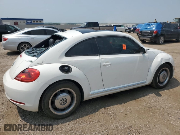 2013 Volkswagen Beetle with VIN 3VWHX7AT2DM656457, listed as a Copart auction lot 63814944 with 92,966 mi miles and Salvage Title. Bid and sale history available at DreamBid. Image 3.