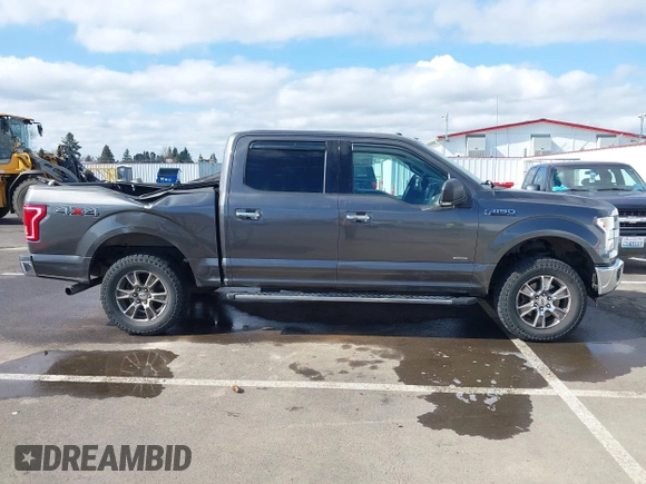 2015 Ford F-150 XLT with VIN 1FTEW1EG1FKE89277, listed as a IAAI auction lot 41752106 with 142,069 mi miles. Bid and sale history available at carsss.com. Image 13.