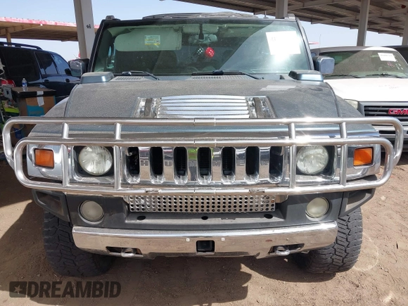 2005 Hummer H2 SUV with VIN 5GRGN23U25H107505, listed as a IAAI auction lot 41703768 with 213,723 mi miles. Bid and sale history available at carsss.com. Image 6.