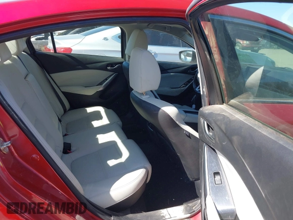 2017 Mazda 6 Grand Touring with VIN JM1GL1W52H1139776, listed as a IAAI auction lot 41671005 with 40,884 mi miles and . Bid and sale history available at DreamBid. Image 8.