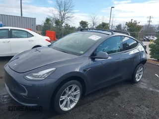 2023 Tesla Model Y Long Range with VIN 7SAYGDEE8PF599254, listed as a IAAI auction lot 41718342 with 24,339 mi miles and . Bid and sale history available at carsss.com. Image 20.