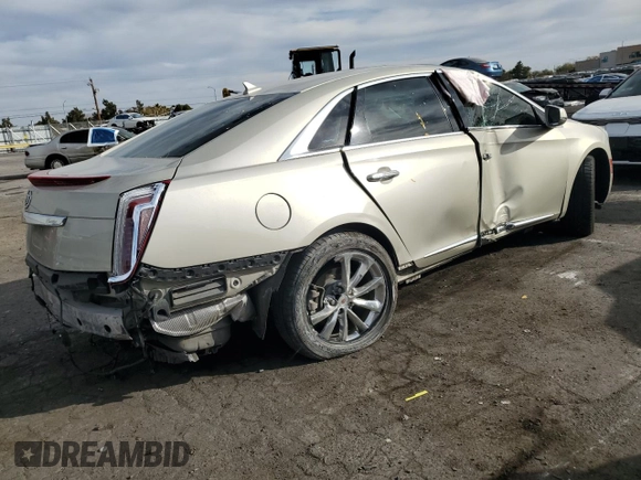 2014 Cadillac XTS Luxury with VIN 2G61M5S31E9314477, listed as a Copart auction lot 43562705 with 136,469 mi miles and Salvage Title. Bid and sale history available at DreamBid. Image 3.