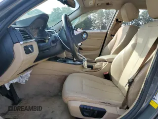 2014 BMW 3 Series 328i with VIN WBA3A5G50ENP33259, listed as a Copart auction lot 57330615 with 217,779 mi miles and Salvage title. Bid and sale history available at DreamBid. Image 7.