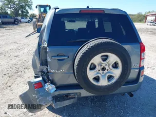 2006 Suzuki Grand Vitara Premium z VIN JS3TD943064100693, wystawiony jako IAAI lot #41772479 z przebiegiem 135 901 mil mil oraz . Historia ofert i sprzedaży dostępna na DreamBid. Obrazek 12.