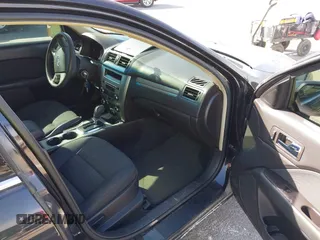 2011 Ford Fusion SE with VIN 3FAHP0HA8BR232236, listed as a IAAI auction lot 41819322 with 196,339 mi miles. Bid and sale history available at carsss.com. Image 5.
