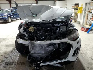 2023 Audi Q5 S line Prestige z VIN WA1FAAFY7P2165319, wystawiony jako Copart lot #83750474 z przebiegiem Nie podano mil oraz Szkoda całkowita • Salvage title. Historia ofert i sprzedaży dostępna na DreamBid. Obrazek 5.
