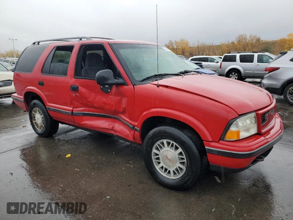 1998 GMC Jimmy SLE with VIN 1GKDT13W1W2508350, listed as a Copart auction lot 77904394 with 175,000 mi miles and Salvage Title. Bid and sale history available at carsss.com. Image 4.