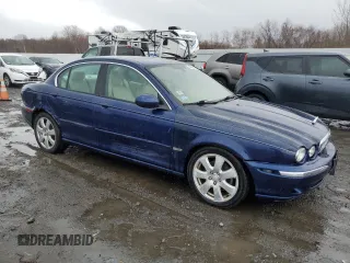 2004 Jaguar X-Type with VIN SAJEA51C74WE00833, listed as a Copart auction lot 49952155 with 109,254 mi miles and Non Repairable. Bid and sale history available at DreamBid. Image 4.