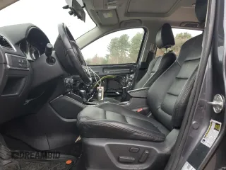 2016 Mazda CX-5 Grand Touring with VIN JM3KE4DY6G0834583, listed as a Copart auction lot 52015905 with 184,741 mi miles and Salvage Title. Bid and sale history available at DreamBid. Image 7.